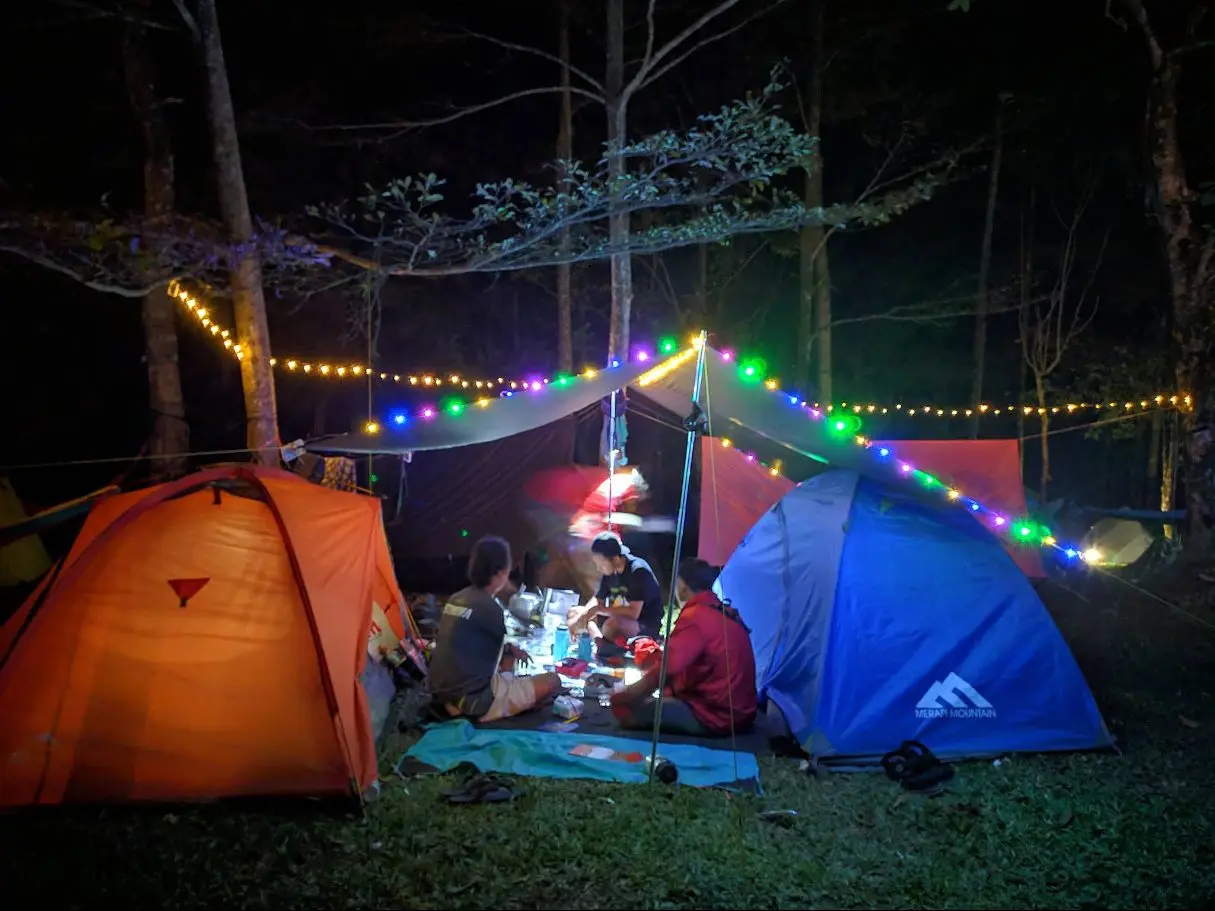 Camping under fairy lights